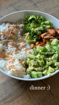 a bowl with broccoli, cauliflower, rice and other foods in it