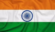 the flag of india is shown in this close up photo, it appears to be waving