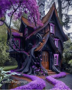 a purple house with trees and flowers around it