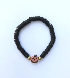 Add a spooky splash to your outfit with this Happy Jack-o-lantern clay bead bracelet! Great for Halloween coming up or a walk in the crisp autumn air. Size: 6.5 inches Lantern Clay, Autumn Bracelet, Clay Bead Bracelet, Jack O'lantern, Crisp Autumn, Clay Bead, Jack O, Clay Beads, Bead Bracelet