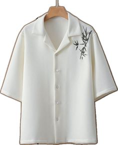 Casual Embroidered Button-up Camp Shirt, Casual Embroidered Top With Camp Collar, Spring Embroidered White Camp Shirt, White Embroidered Camp Shirt For Spring, Casual Short Sleeve Camp Shirt With Floral Embroidery, Summer Embroidered Button-up Camp Shirt, White Camp Collar Top With Floral Embroidery, White Embroidered Summer Camp Shirt, Embroidered Casual Camp Shirt With Relaxed Fit