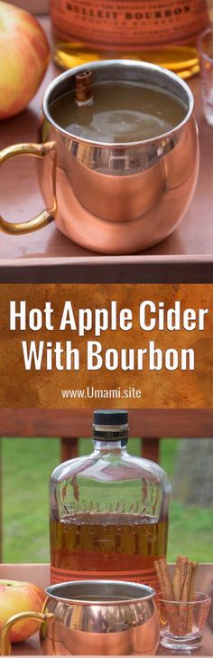 hot apple cider with bourbon in front of apples and cinnamon sticks on a table