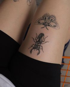 a woman's legs with tattoos on them and a bug tattoo on the leg