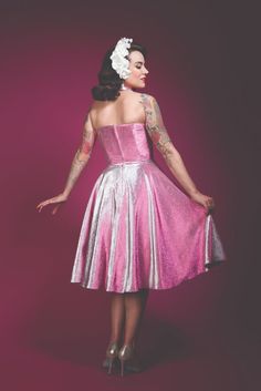 Meet the Lamour Dress from Charm Patterns by Gertie, a vintage-inspired sewing pattern in sizes 2-34, with bust cups A-H. This mix-and-match pattern has nine bodices and two skirts! Find out more at https://charmpatterns.com/shop/lamour-dress/ Pink Dress With Sweetheart Neckline For Costume Party, Pink Sweetheart Neckline Dress For Costume Party, Fitted Dress With Sheer Bodice And Heart-shaped Neckline, Retro Pink Dress With Fitted Bodice, Pink Retro Dress With Fitted Bodice, Le Palais Vintage Dresses, Vintage Lip Service Dress, Fitted 1950s Style Dress With Lace Trim, Pink Fitted Rockabilly Dress