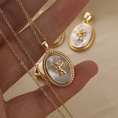 42797364281483 Gold Coin Necklace, Geometric Vintage, Angel Necklace, Necklace Brands, Oval Pendant, Coin Necklace, Water Drop, Gold Coins, Steel Jewelry