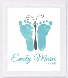 a baby's footprints with the name and date printed on it in blue ink