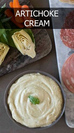 artichoke cream in a bowl next to other food items