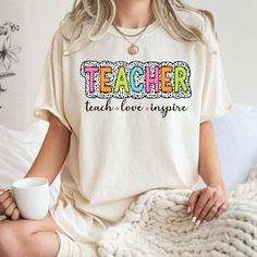 Teacher Shirt, Teacher Dalmatian Shirt, Inspirational Teacher Shirt, Kindergarten Teacher Shirt, Retro Teacher Shirt, Teacher Appreciation Welcome to TwistTrendTee! HOW TO ORDER:   1-Explore Our Gallery: Begin by browsing all the product photos to get a clear idea of what we offer.   2-Select Your Size: Use the "shirt size" dropdown menu to choose the perfect fit. We provide a variety of sizes for T-shirts, sweatshirts, long sleeve shirts, and youth shirts.   3-Pick Your Color: Choose your prefe Multicolor Long Sleeve Pre-shrunk Shirt, Long Sleeve White T-shirt For Teacher Appreciation, White Crew Neck Shirt For Teacher Appreciation, Kindergarten Teacher Shirts, Teacher Inspiration, Kindergarten Teacher, Kindergarten Teachers, School Shirts, Dalmatian