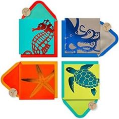 four assorted cards with sea animals and starfish on them, one in the shape of an envelope