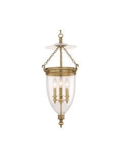 an antique brass finish three light chandelier with clear glass