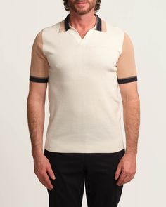 Upgrade your polo game with our colorblock Johnny collar sweater polo. This short sleeve, pullover style features a Johnny polo collar and eye-catching colorblock design. Made with a high-quality viscose blend, this polo not only looks great, but feels great too. Johnny polo collar Short sleeve Pullover style Colorblock design Viscose blend Hand wash or dry clean only Size + Fit About 27.5" from shoulder to hem Model measurements: 6'1" tall Model is wearing a size M Style: ETR2207M Polo Game, Sweater Polo, Johnny Collar, Elie Tahari, Short Sleeve Pullover, Collar Sweater, Sweater Pants, Knit Pants, Camping Shirt