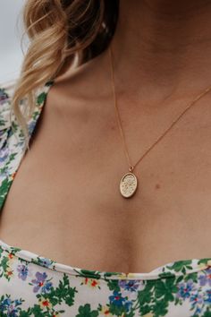 Delicate matte gold plated pendant depicting a hand holding a small posy on a gold filled fine trace chain. We love to celebrate the unique and personal style of every woman through our necklaces. This beautiful pendant is the perfect for layering, for a statement look or worn alone for effortless everyday accessorizing. The perfect finishing touch no matter what the occasion.  Product Details: . Chain Length: Available on a 16", 18" or 20" gold filled fine trace chain . Charm Material: Brass . Wildflower Necklace, Happy To Meet You, Whimsical Jewelry, Whimsical Gifts, Oval Necklace, Necklace Flower, Fortune Teller, Brass Charms, Gold Flower