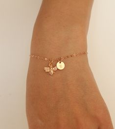 "This Sweet Honeybee Bumble Bee Charm (18k rose gold plate over solid sterling silver ) measures 12x10mm and floats freely on a rose gold filled chain, with rose gold spring clasp. The bracelet in the photo is 6.5\", but I have very petite wrists, so please choose the size that will work best for you. And to note, 7.5\" is a good size for an average woman. STEP 1: Choose the style of necklace you'd like - either a Bee - No Initial, or Bee + 1 Initial Disc, etc. STEP 2: Choose the length for the Cat Necklace Gold, Bumble Bee Necklace, Bee Lover Gifts, Bee Jewelry, Earrings Rose Gold, Gold Bee, Bee Gifts, Bee Necklace, Bee Earrings