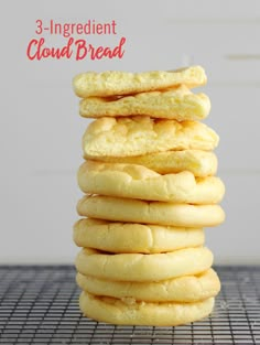 a stack of shortbread cookies sitting on top of a metal cooling rack with the words 3 ingredient cloud bread