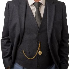 A Gold-colored pocket chain with a charm by the pocket is an elegant accessory that adds sophistication to every outfit. With different lengths (from 8 to 18 inches), the chain can be adjusted to individual needs. It will be a perfect choice for a suit, blazer, or pants with a classic background. Its universal character makes it a great gift for everyone - men and women. Regardless of the occasion - birthdays, name days, or holidays - it will definitely please every recipient. T-Bar measure: 30m Suit Chain Mens, Gold Suit Accessories, Gold Pocket Watch With Chain For Formal Occasions, Suit With Jewelry, Suit With Chain, Suit Chain, Three Piece Suit Wedding, Classic Background, Alfred Dunhill