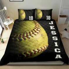 a bed with a baseball on it in a room