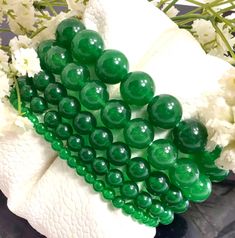 ✦Gemstone: Jade ✦Color: Green ✦Shape: Round  ✦Length: 5''-9'' ✦Bead Size: 4mm 6mm 8mm 10mm 12mm ✦QTY: 1 pc / package ✦✦Please measure your wrist size, then order the bracelet. Jade is a symbol of serenity and purity.  It signifies wisdom gathered in tranquility.  It increases love and nurturing.  A protective stone, Jade keeps the wearer from harm and brings harmony.  Jade attracts good luck and friendship.  It stabilises the personality and promotes self-sufficiency.  Soothes the mind, releasin Jade Bracelet, Coral Beads, Jade Beads, Mens Jewelry Bracelet, Green Jade, Beaded Stretch Bracelet, Stretch Bracelet, Bracelet Gift, Stretch Bracelets