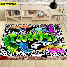 a room with a large rug that has graffiti on it and an image of a soccer ball in the center