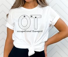 "Occupational Therapy T-Shirt Pediatric Occupational Therapist Handwriting TShirt Peds Occupational Therapy Gift for COTA OT Student Shirt This cute handwriting \"occupational therapist\" t-shirt is perfect for pediatric occupational therapists, school occupational therapists, COTAs, and OT/OTA students! HOW TO ORDER: 1. Select your shirt color, size, and/or style 2. Click \"Add To Cart\". If you are ordering more than one shirt, go back to the listing and select specific style/color/size for each one 3. Click \"Proceed to checkout\" PRODUCT DETAILS: -Solid colors: 100% cotton -Ash: 99% cotton, 1% polyester -Heather colors and solid black blend: 52% and 48% polyester -Athletic heather and black heather: 90% cotton, 10% polyester CARE/WASH INSTRUCTIONS: -Wash shirt inside-out in cold water Occupational Therapy Svg Free, Occupational Therapy Stickers, Occupational Therapy Assistant Shirts, Pediatric Occupational Therapy Shirts, Occupational Therapy Shirts Design, Occupational Therapy Gifts, Cute Handwriting, Occupational Therapy Shirts, Therapy Gift