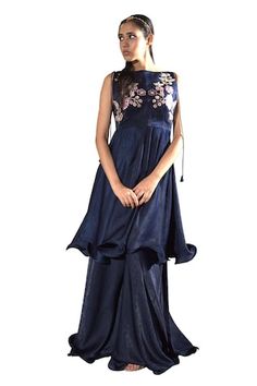 Navy blue pleated tunic with floral embroidered bodice. Paired with a sharara. - Aza Fashions Designer Sleeveless Silk Dress, Sleeveless Anarkali Dress In Silk, Blue Anarkali Dress With Ruffles, Anarkali Dresses With Ruffles, Blue Sleeveless Floral Embroidery Sets, Blue Sleeveless Sets With Floral Embroidery, Anarkali Dress With Ruffles And Peplum Design, Designer Blue Sharara For Spring, Anarkali Dresses With Ruffles And Peplum