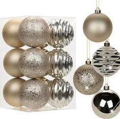 silver and gold christmas ornaments in a clear box