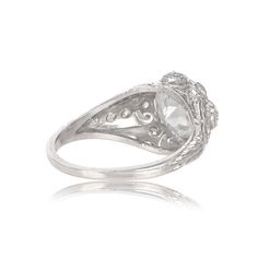 An original Art Deco era engagement ring that features an old European cut diamond weighing 2.57 carats, J color, and SI1 clarity. Platinum Art Deco Ring With Bezel Setting, Classic Dome Ring With Prong Setting For Wedding, Heirloom Dome Ring With Bezel Setting For Wedding, Classic Domed Rose Cut Diamond Jewelry, Classic Domed Jewelry With Rose Cut Diamonds, Antique Oval Diamond Ring With Bezel Setting, Elegant Domed Rings With Rose Cut Diamonds, Anniversary Rings With Rose Cut Diamonds, Heirloom Oval Dome Ring With Rose Cut Diamonds