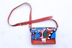 Artistic Leather Shoulder Bag With Adjustable Strap, Hand Painted Brown Rectangular Shoulder Bag, Artistic Rectangular Shoulder Bag With Adjustable Strap, Hand Painted Crossbody Bags For Travel, Hand Painted Crossbody Travel Bag, Artistic Leather Bags With Adjustable Strap, Artistic Crossbody Bag With Adjustable Strap, Multicolor Rectangular Saddle Bag With Adjustable Strap, Multicolor Rectangular Belt Bag With Removable Pouch