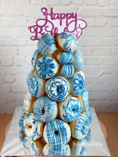 a cake made to look like a christmas tree with blue and white frosting on it