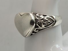 This is a lovely silver filagree heart ring in size 7.75 East Village Bangles is the product of love ❤️, a unique collection of vintage jewelry painstakingly restored by Casey in the East Village. Ours is a people business as much as a jewelry business. Even as we put love, sweat (and sometimes tears!) into restoring these items, it is our policy that you must be thrilled. We stand behind every item and we will take it back if it is not for you. Vintage Silver Ring, Heart Rings, Heart Band, Precious Rings, Vintage Silver Rings, Silver Heart Ring, Antique Ring, Ring Antique, East Village