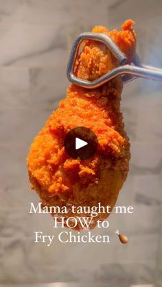 a piece of fried food hanging from a hook with the words mama taught me how to fry chicken