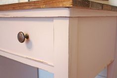 a close up of a drawer on a dresser