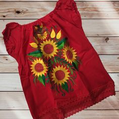 Handmade Embroidered Mexican Sunflower Blouse - Size Medium Large Handmade in Chiapas, Mexico Material: Manta (Natural Cotton) Size Medium Measurements (approximate): Length: 23 inches Armpit to Armpit: 19 inches Size Large Measurements (approximate): Length: 25 inches Armpit to Armpit: 21 inches Size: XL Measurements (approximate): Length: 24 inches Armpit to Armpit: 24 Care Instructions: We recommend hand washing in cold water with like colors & air drying. A warm iron can be used if needed. Our blouses are handmade and may have slight imperfections that make them unique & one of a kind. Please check out the photos & feel free to send us a message if you have any questions. Spring Cotton Embroidered Top With Machine Embroidery, Summer Cotton Blouse With Floral Applique, Summer Folk Style Embroidered Top, Peasant Floral Embroidered Top For Beach, Summer Multicolor Embroidered Fabric, Bohemian Floral Embroidered Fabric For Summer, Bohemian Cotton Tops With Machine Embroidery, Spring Embroidered Flower Tops, Multicolor Embroidered Floral Fabric For Summer