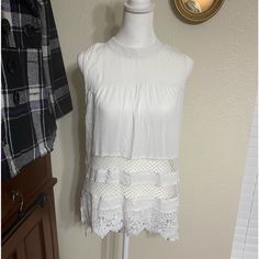 Adorable White Sheer Romeo & Juliet Couture Sleeveless Blouse. Zip Up Back. Hangs Beautifully. Lightweight. New With Tags. Size Small. Chic Summer Lace Top For Layering, Chic Lace Top For Summer Layering, Fitted Lace Top For Summer Layering, Lace Sleeveless Tank Top For Layering, Sleeveless Lace Top With Lace Trim For Layering, Chic Sleeveless Lace Trim Top, Chic Sleeveless Lace Top With Lace Trim, Feminine Summer Lace Top For Layering, Feminine Lace Top For Summer