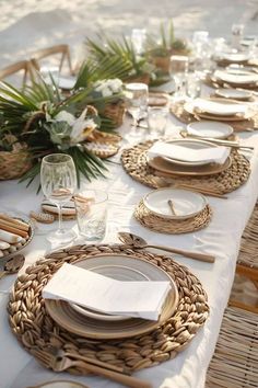 the table is set with place settings for dinner