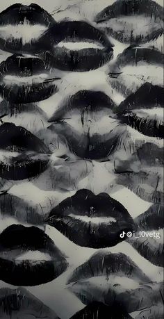 black and white photograph of lips in the rain with water droplets on them, taken from above