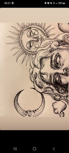 an image of a drawing on paper with the sun and moon in it's center