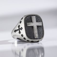 This beautiful, simple sterling silver signet ring features a single engraved cross that is slightly raised on the surface of the ring. An elegant and simple piece of Christian jewelry, this silver rings makes a wonderful gift for any special occasion including Christmas and anniversaries. This engraved silver signet ring is perfect to wear alone or stack with other rings in your collection. The oxidized finish and other finish options on this beautiful sterling silver minimalist cross signet ri Mens Silver Ring, Signet Ring For Men, Engraved Cross, Christmas Gift For Him, Faith Cross, Silver Signet Ring, Christmas Gifts For Him, Christian Cross, Cross Ring