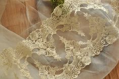 Vintage style lace fabric trim in soft ivory color . Width: about 22 cm/ 8.6'' , I am selling this in one yard , more yardages will be cut into one piece . This stunning design piece has very soft hand feel, ideal for clothing, party dress, lingeries, dolls outfits, curtains, shams, lamp shades, * Ideal for ivory lace trim, ivory lace dress, ivory bridal garter, ivory flower girl dress, lace dress, bridal dress and wedding gown .https://www.etsy.com/shop/beautyfabric Jewelry Headband, Gold Lace Fabric, Corded Lace Fabric, Ivory Flower Girl, Ivory Lace Dress, Ivory Flower Girl Dresses, Grace And Lace, Wedding Veils Lace, Lace Veil