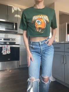 AUTHENTIC VINTAGE - never an imitation - Every item in my store is 1 of 1 I only have one of each item as they are very hard to find :) so if you like this item please buy quickly as once they sell I do not have another Vintage Green Bay Packers football jersey custom crop top shirt 1990s originally full length cut into this custom crop  nice vintage condition  Was a kid xl fits size modern x-small  model is 5'5 120 lbs for a size reference Gold Football, Custom Crop Top, Green Bay Packers Football, Cropped Tee Shirt, Football Vintage, Packers Football, Football Nfl, Crop Top Shirts, Cropped Tube Top