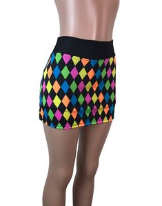 Step up your game in this fun neon diamond or argyle print athletic skirt with built in compression shorts and pocket.  This golf, tennis, running or sports skirt is slim-style, but allows for plenty of movement, made of high quality performance spandex. The compression shorts are uniquely designed to be incredibly comfortable and won't ride up during activity. The pocket is positioned on the side of the shorts, and will fit your phone, keys, ID, etc. *Please see size chart in images above for s Multicolor Stretch Mini Skort, Neon Diamond, Running Skirt, Sports Skirt, Athletic Skirts, Argyle Print, Running Skirts, Golf Skirt, Slim Skirt