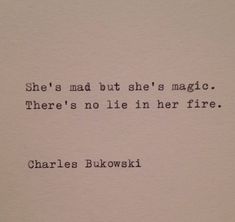 an old typewriter with the words she's mad but she's magic there's no lie in her fire