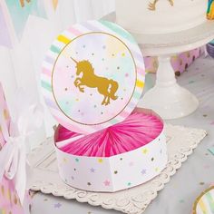 there is a cake box with a unicorn on it