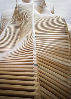 a wooden structure with wavy lines on it