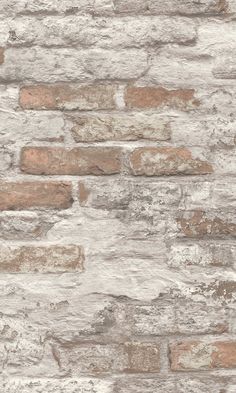 an old brick wall is shown in grey and brown tones, with some white paint on it