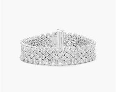 The 14K White Gold Mesh Lab-Created Diamond Bracelet is a truly stunning piece of jewelry. The delicate mesh of white gold is set with brilliant lab-created diamonds, creating a truly dazzling effect. It will make you shine like a star. The bracelet is made of high-quality materials that will last for years to come. aka Diamond Bracelets Platinum Diamond Bracelet With Pave Setting, White Platinum Diamond Bracelet With Accents, White Diamond Bracelet With Jubilee Design, White Diamond Bracelet With Pave Setting For Formal, White Platinum Diamond Jubilee Bracelet, Formal White Diamond Bracelet With Pave Setting, Timeless White Bracelets With Single Cut Diamonds, White Platinum Jubilee Diamond Bracelet, White Diamond Bracelet In Platinum Luxury Style