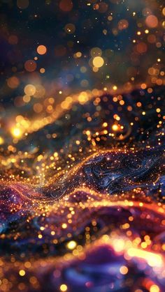 an abstract background with blurry lights and sparkles in the dark blue, yellow and pink colors