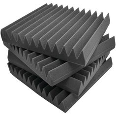 three acoustic foams stacked on top of each other in front of a white background