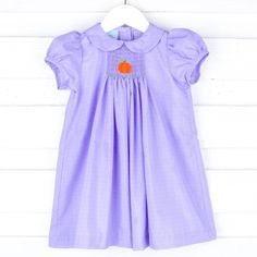 Your little one will be ready for the pumpkin patch in this adorable Pumpkin Single Smocked Purple Dress! This dress features a charming single smocked pumpkin on purple windowpane shirting fabric, making it perfect for all your fall outings. Fall Outings, Shirting Fabric, Beach Birthday, Street Kids, Girl's Back, Bubble Dress, Baby Swimming, Pajama Pant, Fabric Making