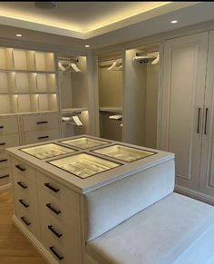 a large white bed sitting inside of a bedroom next to a walk - in closet