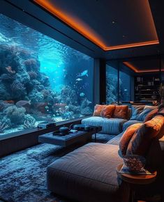 a living room filled with furniture and an aquarium